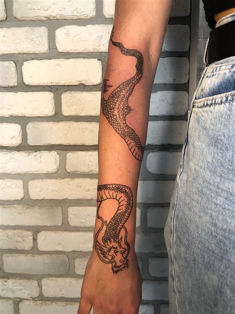 dragon wrapped around arm tattoo|cute dragon tattoos for arms.